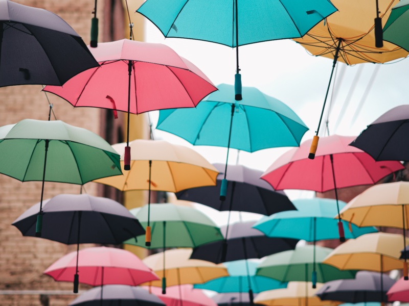 Colourful umbrellas in the rain