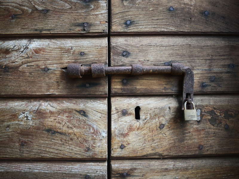 Old locked wooden door