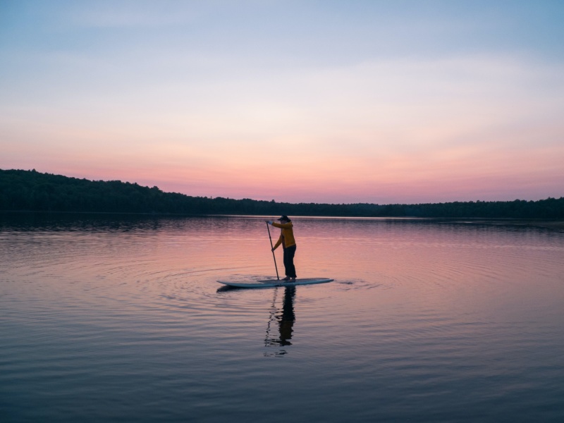 Paddle boarding at sunset