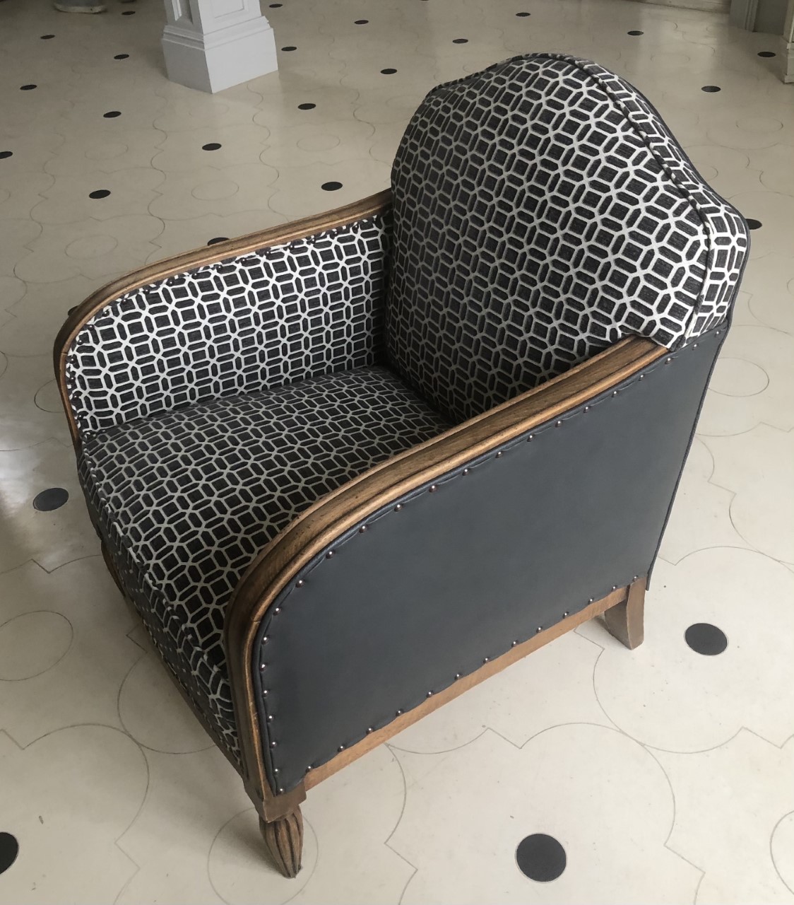 One of a pair of Paris Club chairs